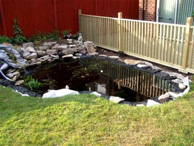 Pond with safety grid below water - Pond Safety Systems, Ireland